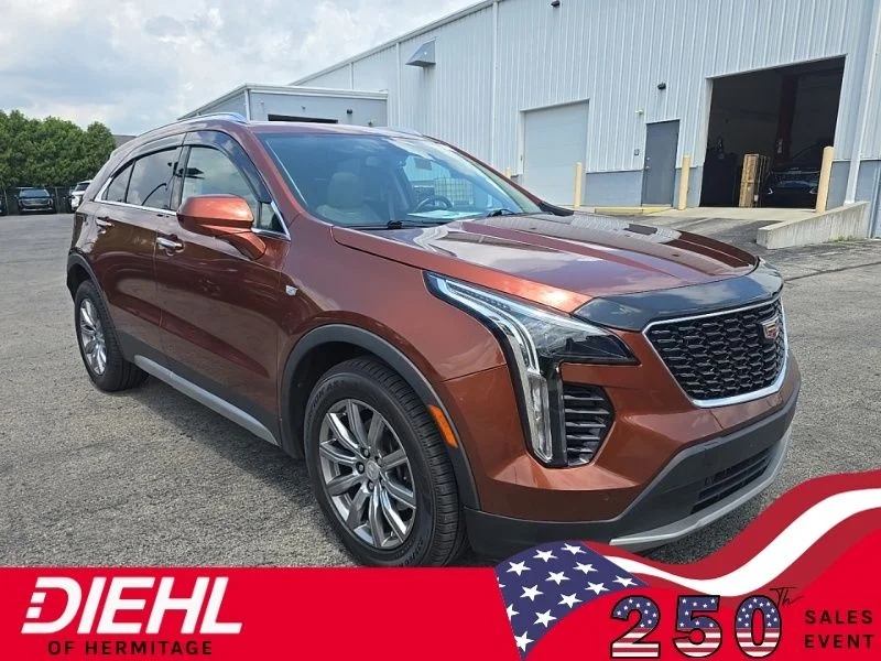 Used 2019 Brown Cadillac Premium Luxury image 1