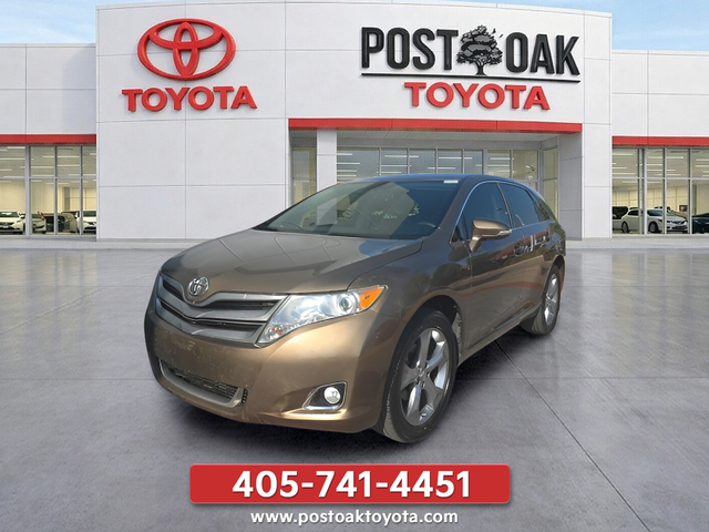 Used 2013 Gold Toyota LE image 1