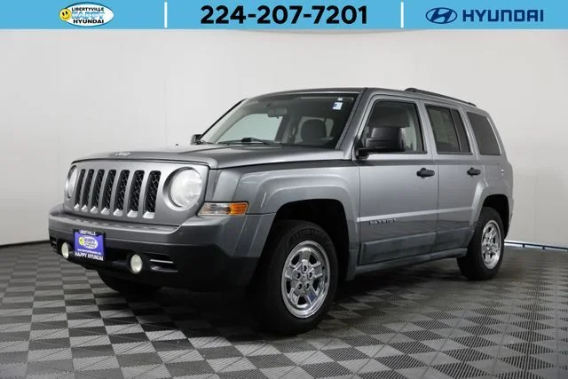 Used 2011 Gray Jeep Sport image 1
