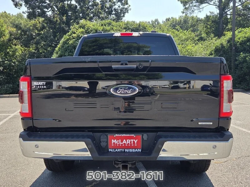 Used 2021 Black Metallic FORD LARIAT 4WD SUPERCREW 5.5