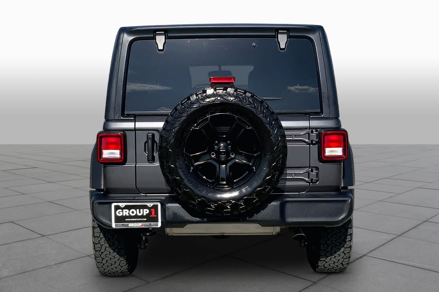 Used 2022 Granite Crystal Metallic Clearcoat Jeep Unlimited Sport S image 5