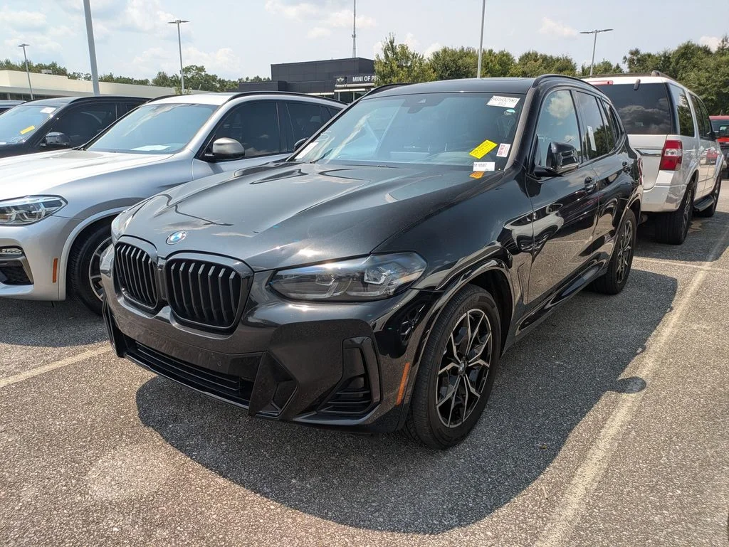 Used 2023 Black BMW sDrive30i image 1