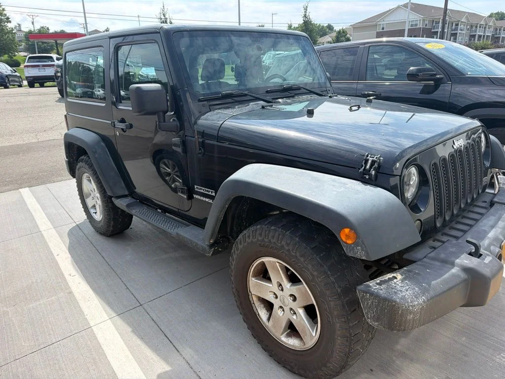 Used 2014 Jeep Wrangler Sport with VIN 1C4AJWAG3EL134829 for sale in Marion, IA