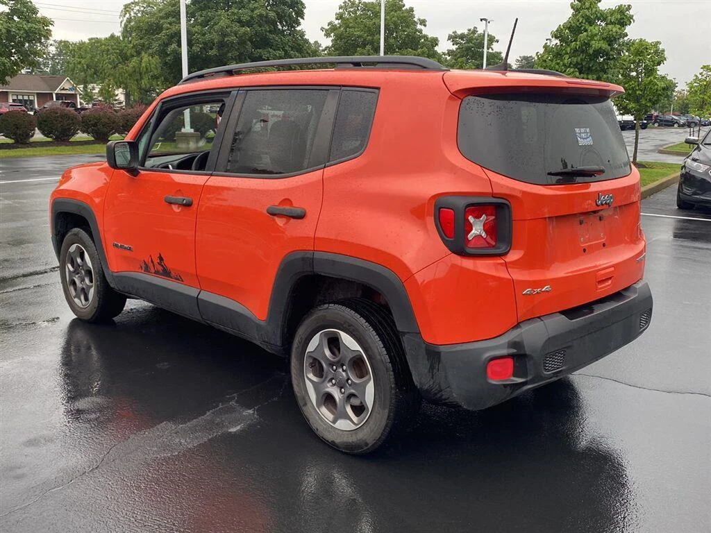 Used 2018 Omaha Orange Jeep Sport image 8