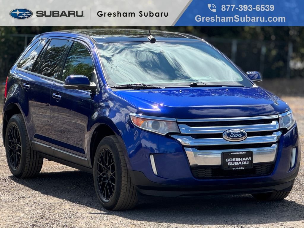 Used 2014 Blue Metallic Ford SEL image 1