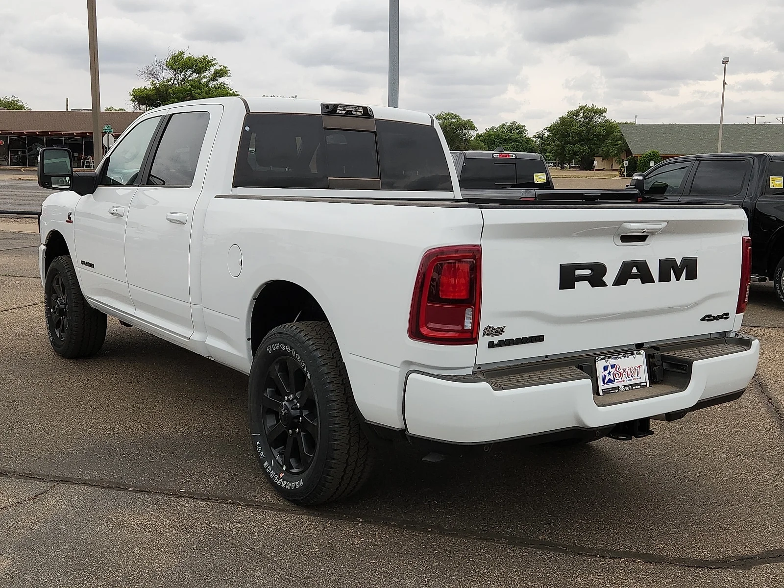 New 2026 PW7 Bright Whit Ram LARAMIE CREW CAB 4X4 6