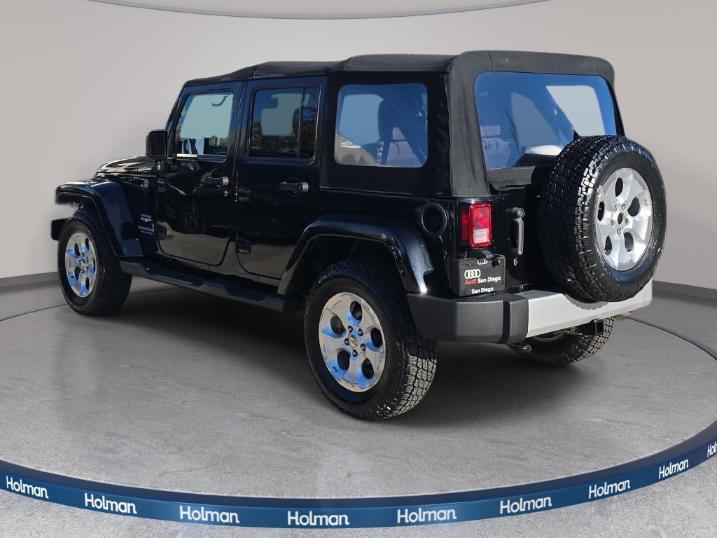 Used 2015 Black Jeep Unlimited Sahara image 8