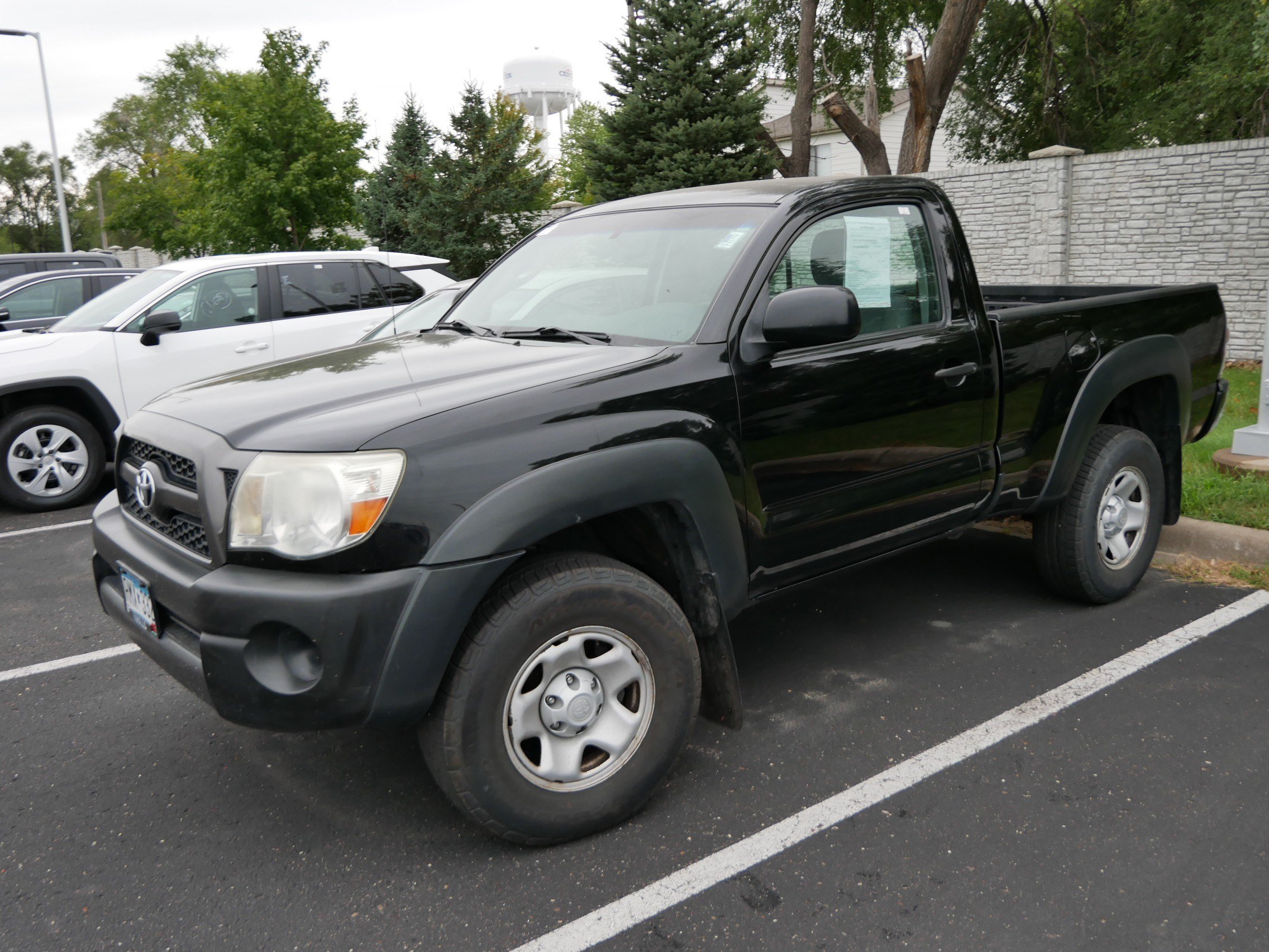 Used 2011 Black Toyota REG CAB 4WD AT image 2