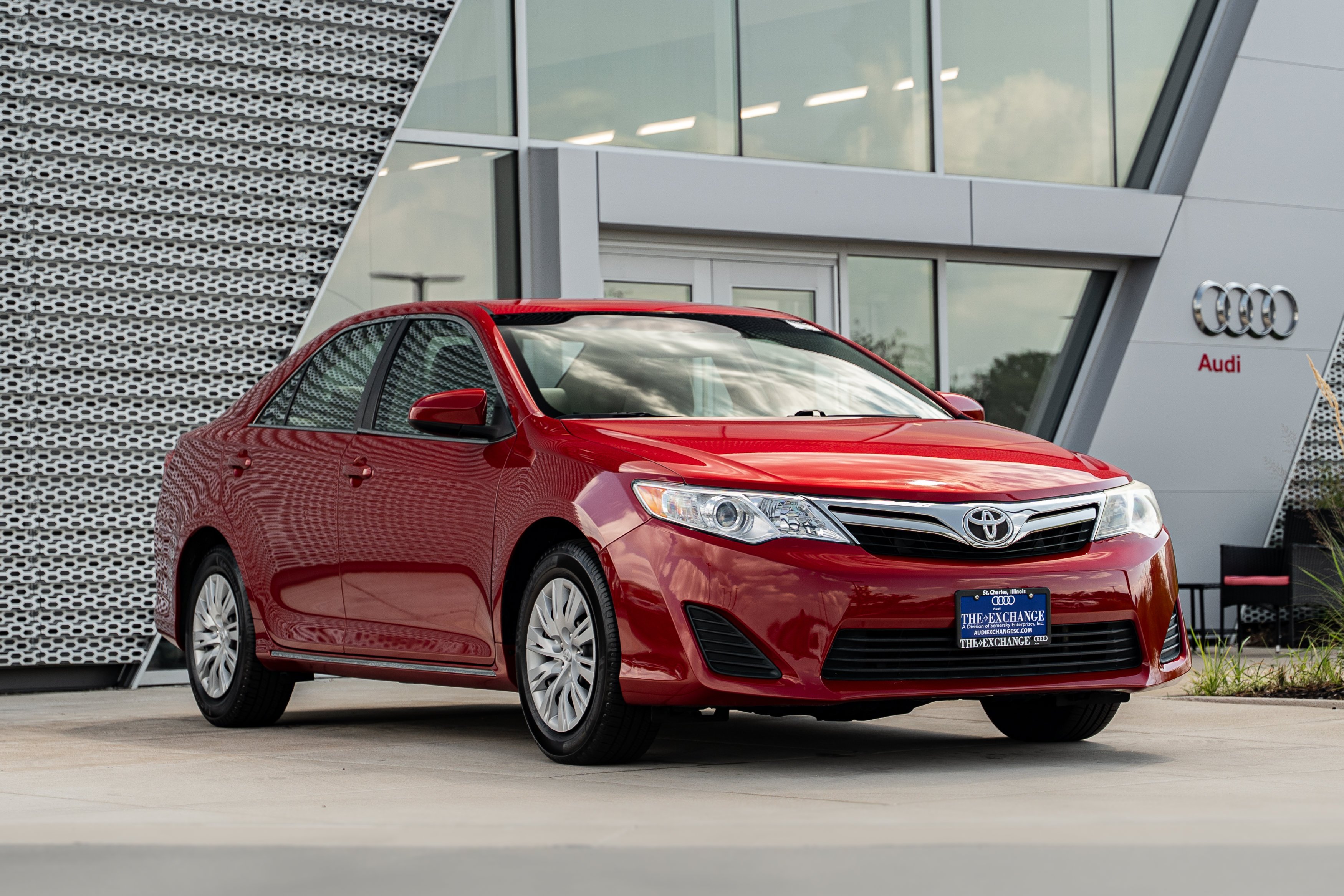 Used 2014 Barcelona Red Metallic Toyota LE image 1