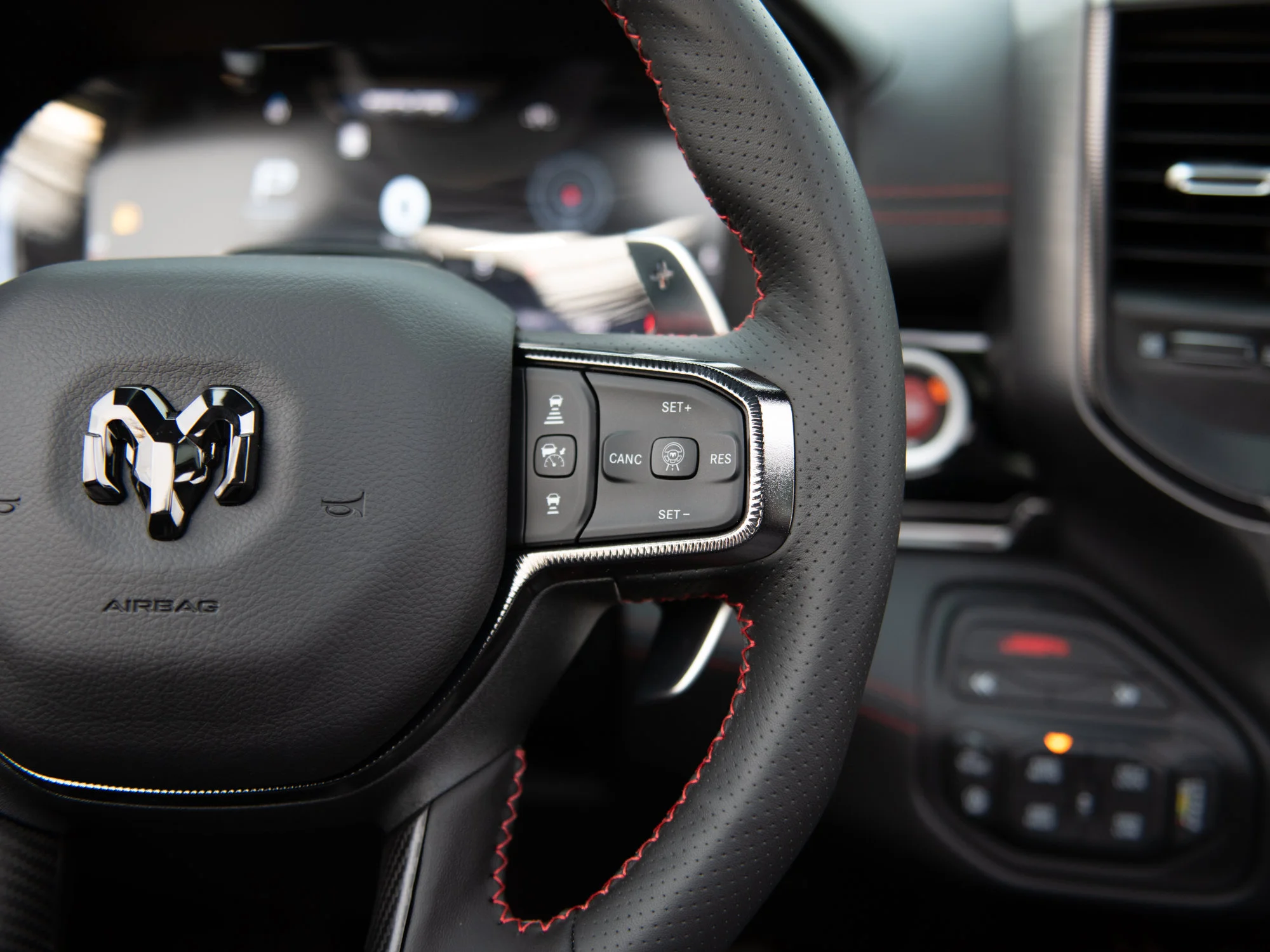 New 2026 Black RAM RHO* Crew Cab 4x4, 540HP, 35 Inch Tires, Massage Seats, Passenger Screen image 23