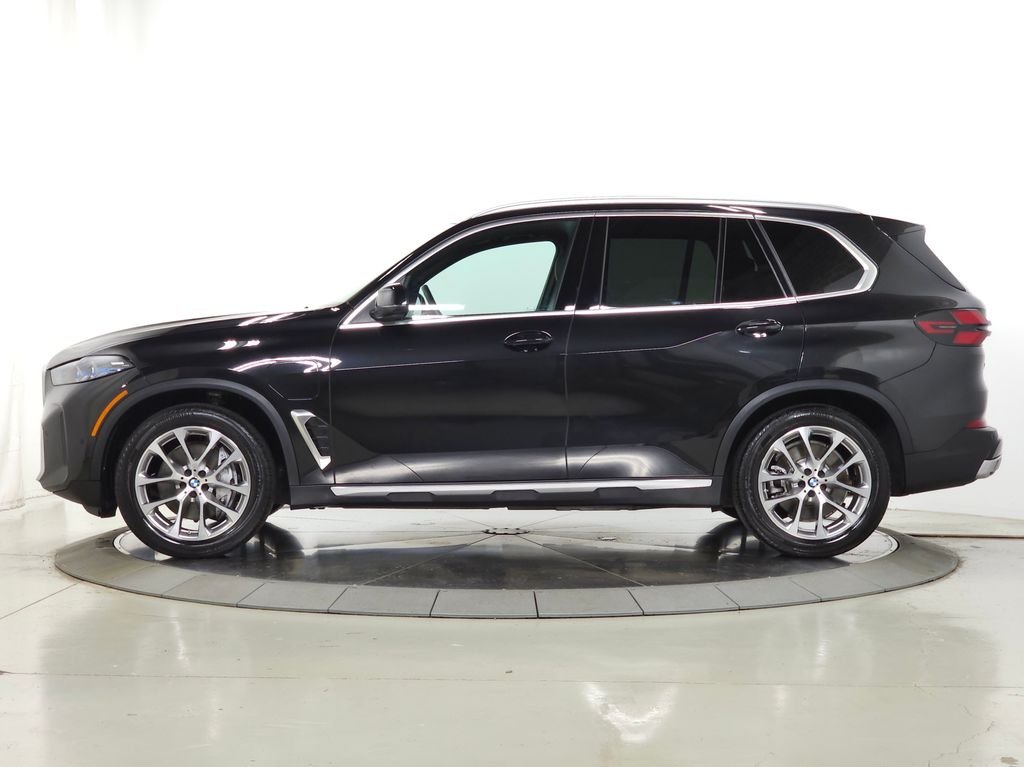 Used 2026 Black Sapphire Metallic BMW xDrive50e image 4