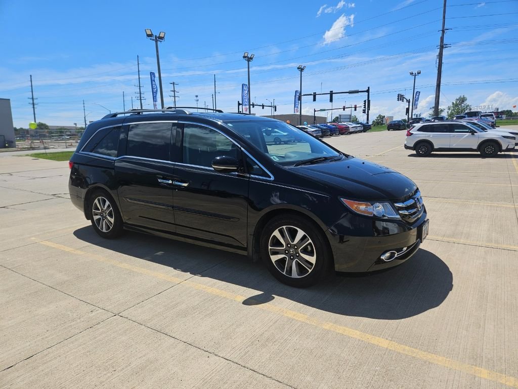 Used 2014 Crystal Black Pearl Honda Touring image 1