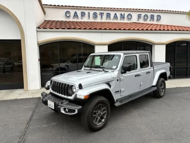 Used 2024 Silver Zynith Clearcoat Jeep Sport S image 1