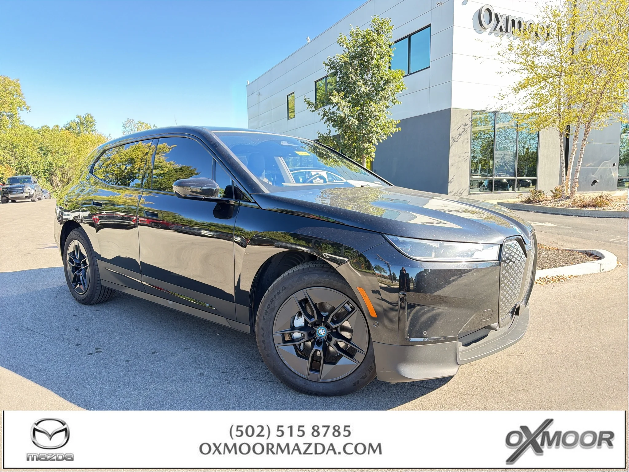 Used 2024 Black Sapphire Metallic BMW xDrive50 image 1