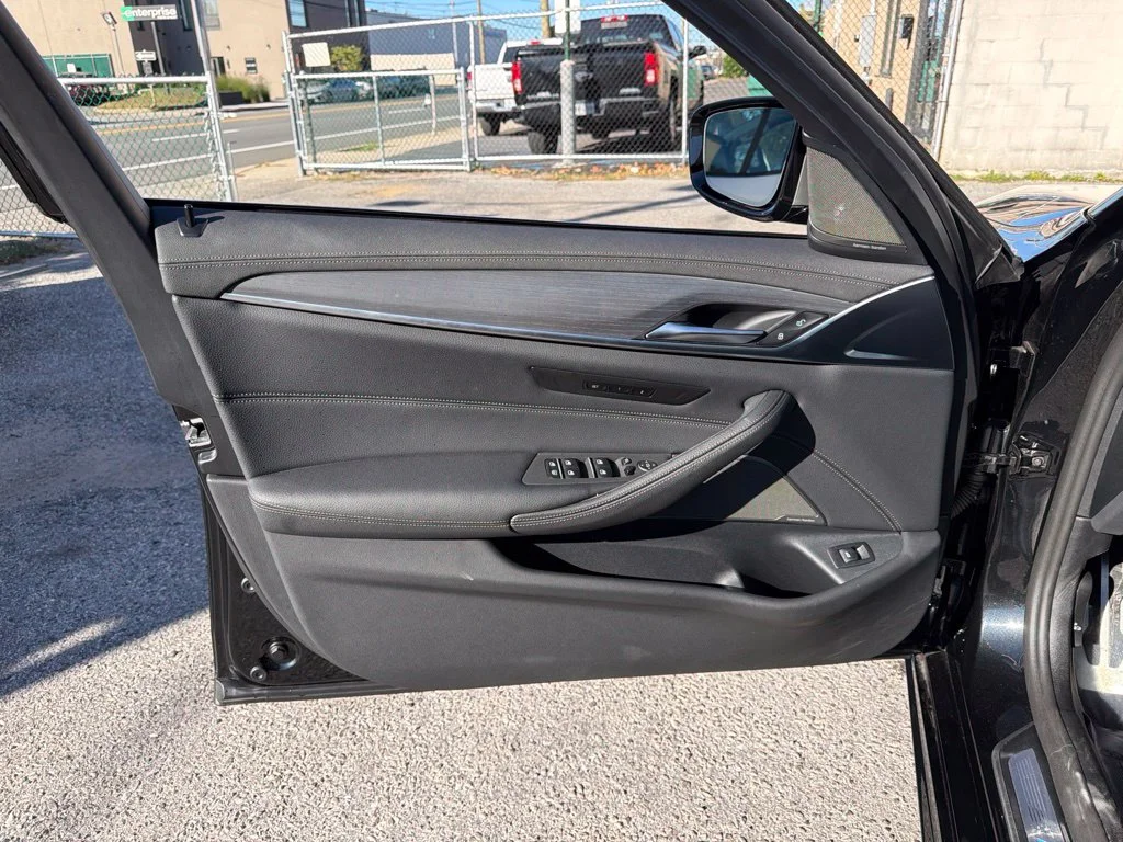 Used 2023 Black BMW M550i xDrive image 24