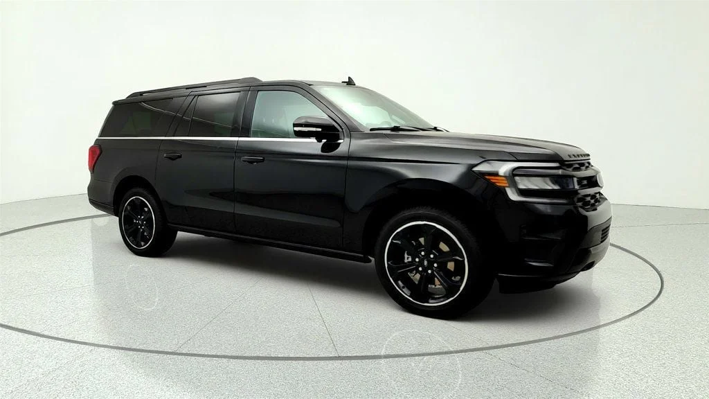 Used 2023 Agate Black Metallic Ford Limited 4x4 w/ Heavy-Duty Trailer Tow Pkg image 3