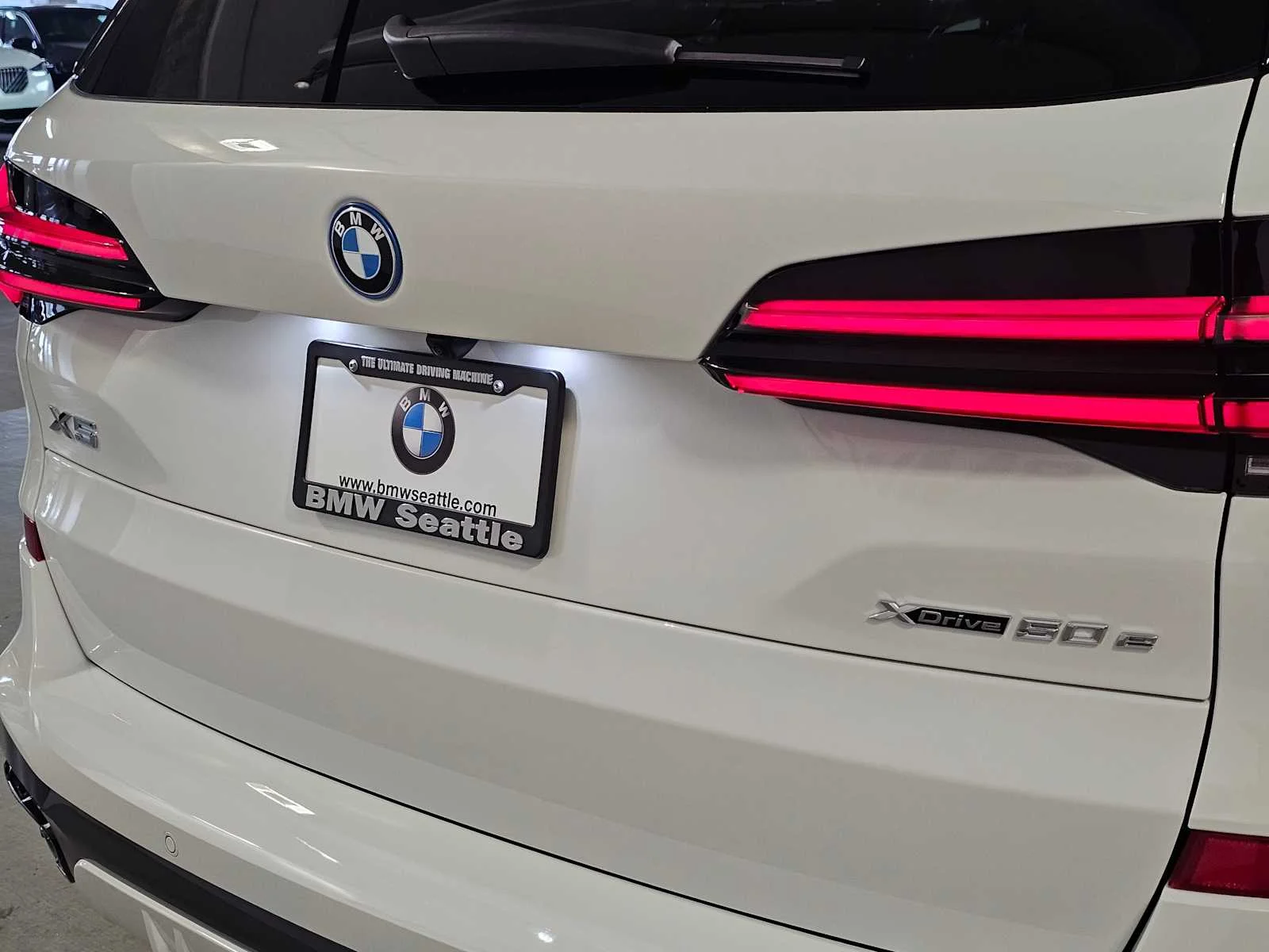 New 2026 Alpine White BMW xDrive50e image 7