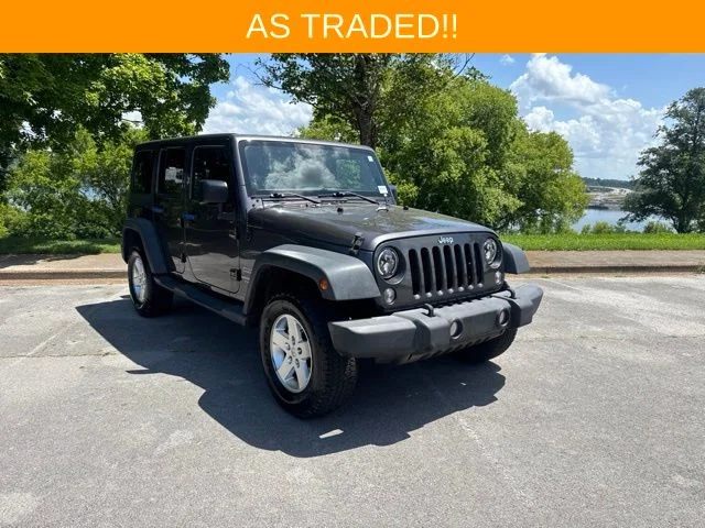 Used 2014 Gray Jeep Unlimited Sport image 1