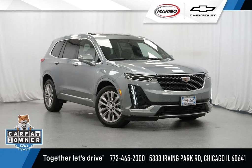 Used 2023 Argent Silver Metallic Cadillac Premium Luxury image 1