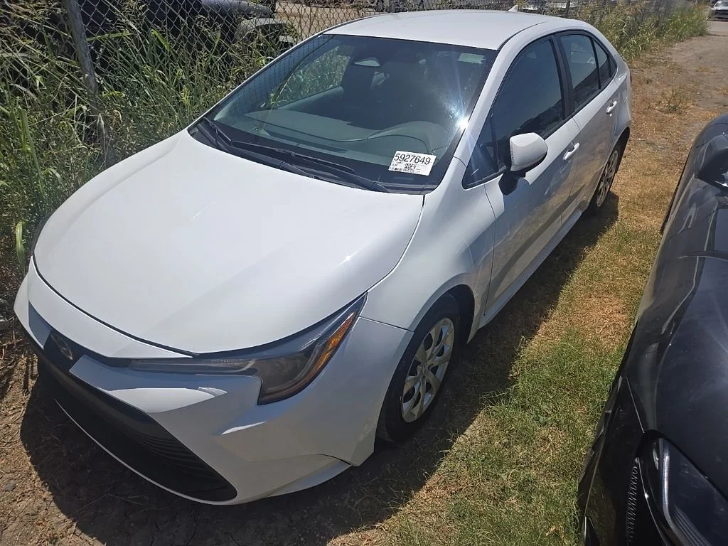 Used 2023 White Toyota LE image 1