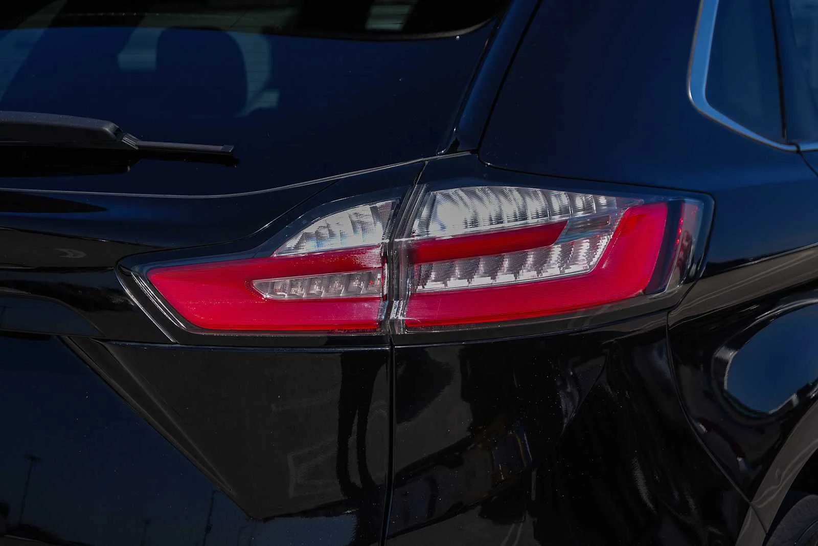 Used 2021 Agate Black Metallic Ford SEL image 11