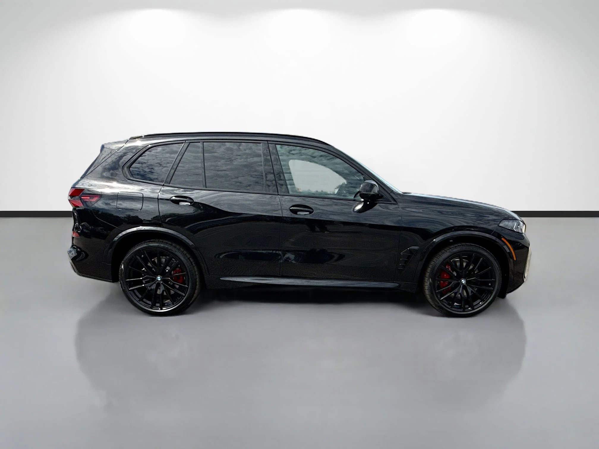 New 2026 Black Sapphire Metallic BMW M60i image 2