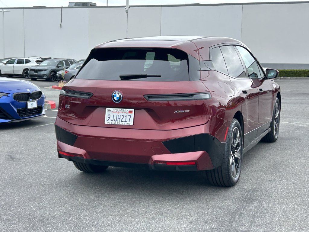 Certified Used 2024 Red Metallic BMW xDrive50 image 5