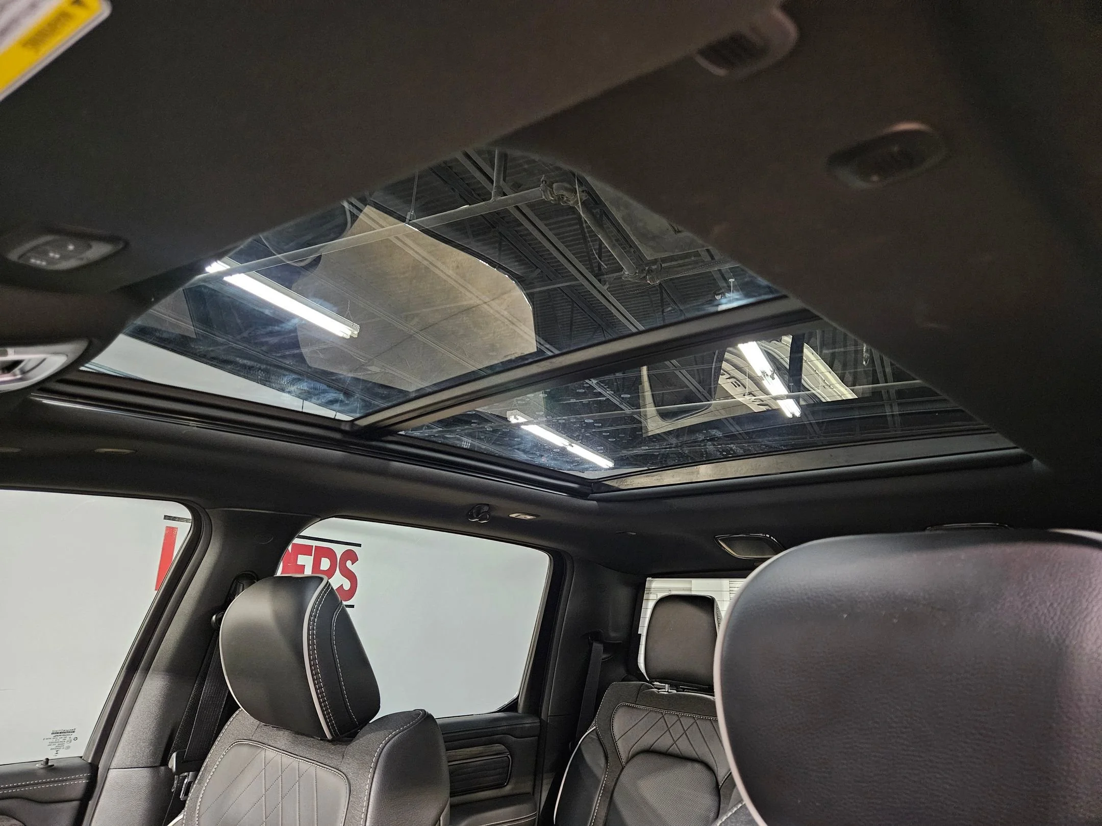 Used 2025 Bright White Clearcoat Ram Limited image 26