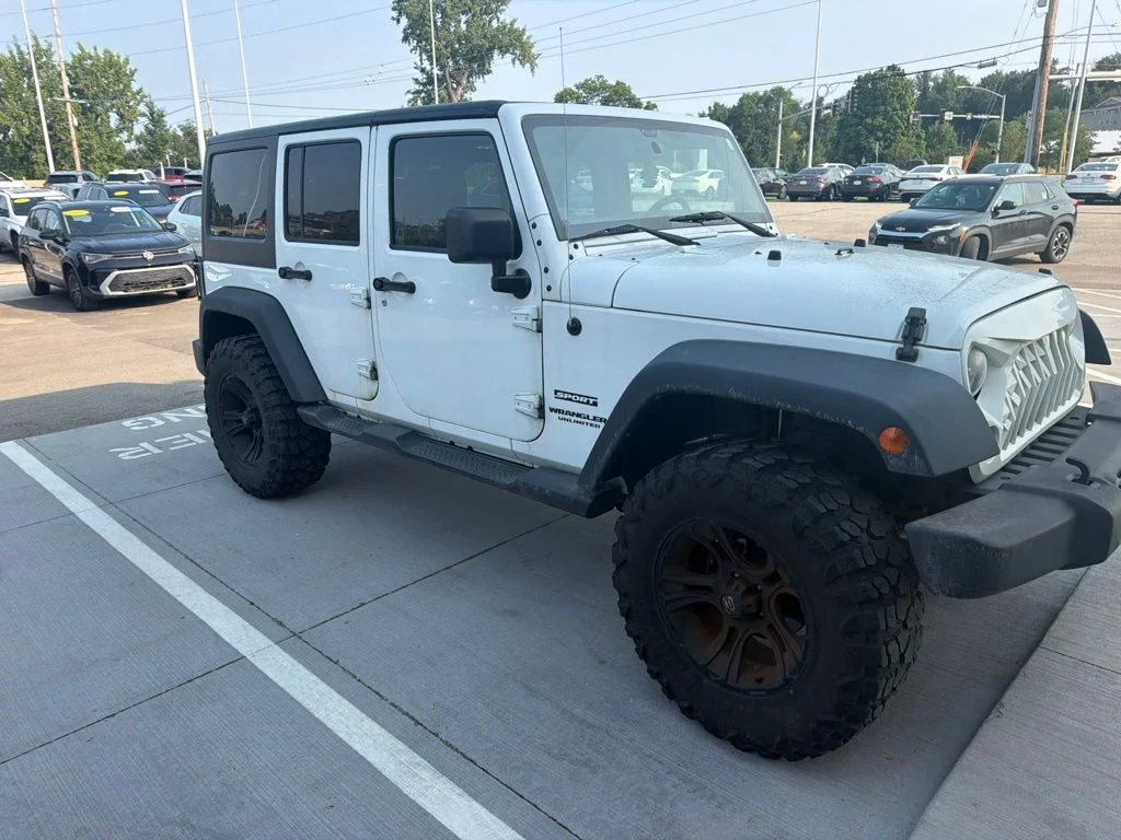 Used 2014 White Jeep Unlimited Sport image 7