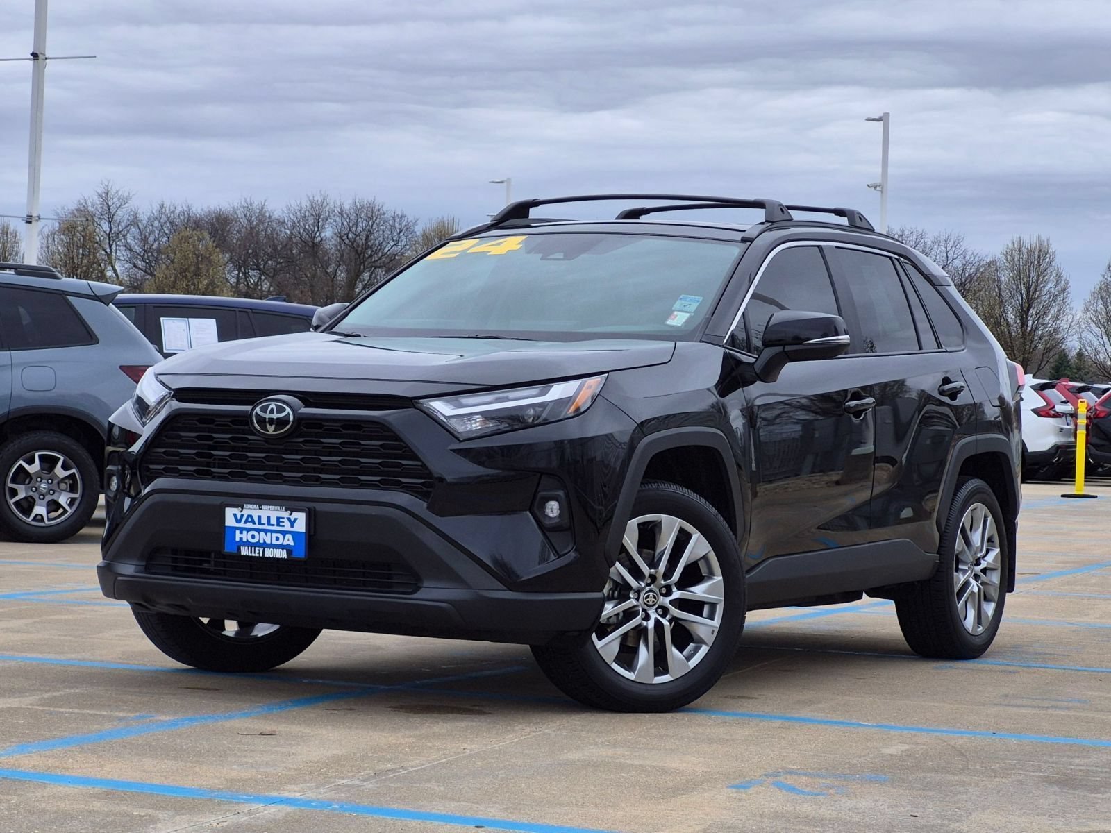 Used 2024 Midnight Black Metallic Toyota XLE Premium AWD image 2