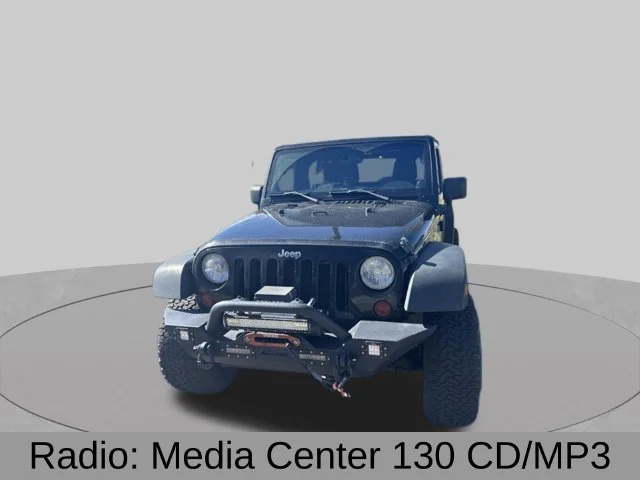 Used 2011 Black Jeep Unlimited Sport image 3