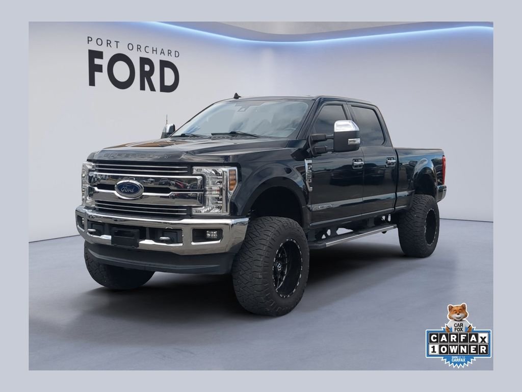 Used 2019 Black Metallic Ford Lariat image 1