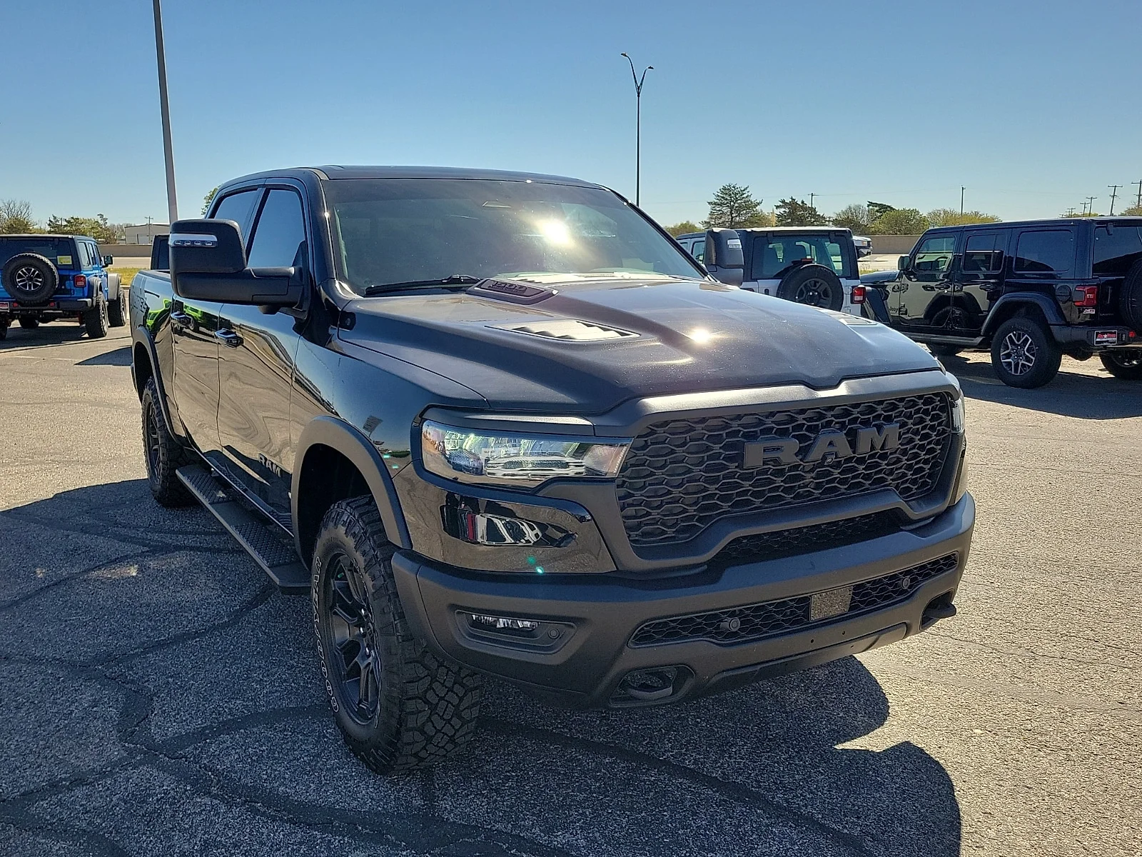 New 2026 Diamond Black Crystal Pearlcoat Ram REBEL CREW CAB 4X4 5