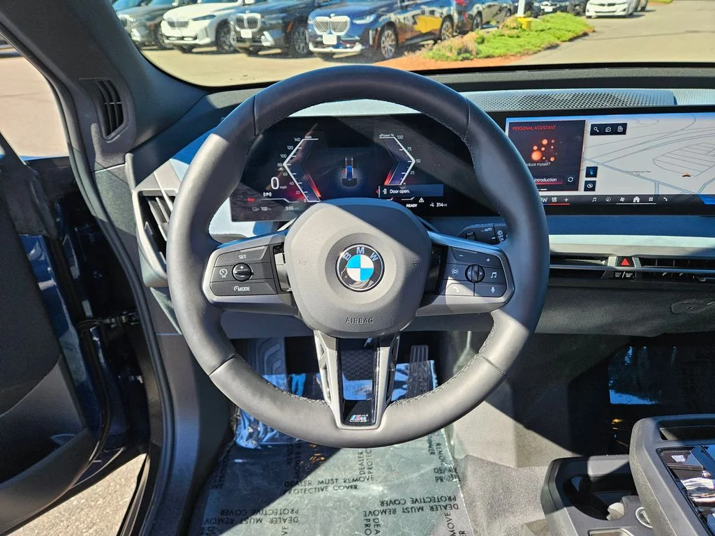 Certified Used 2025 Blue BMW xDrive50 image 25