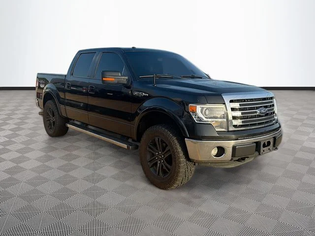 Used 2014 Black Ford Lariat image 1