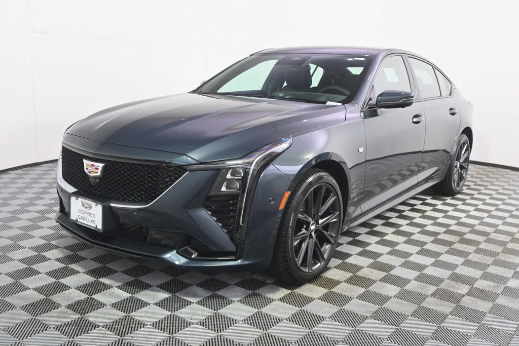 New 2026 Deep Space Metallic Cadillac Sport image 1