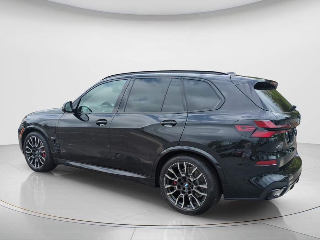 New 2026 Black Sapphire Metallic BMW xDrive50e image 14