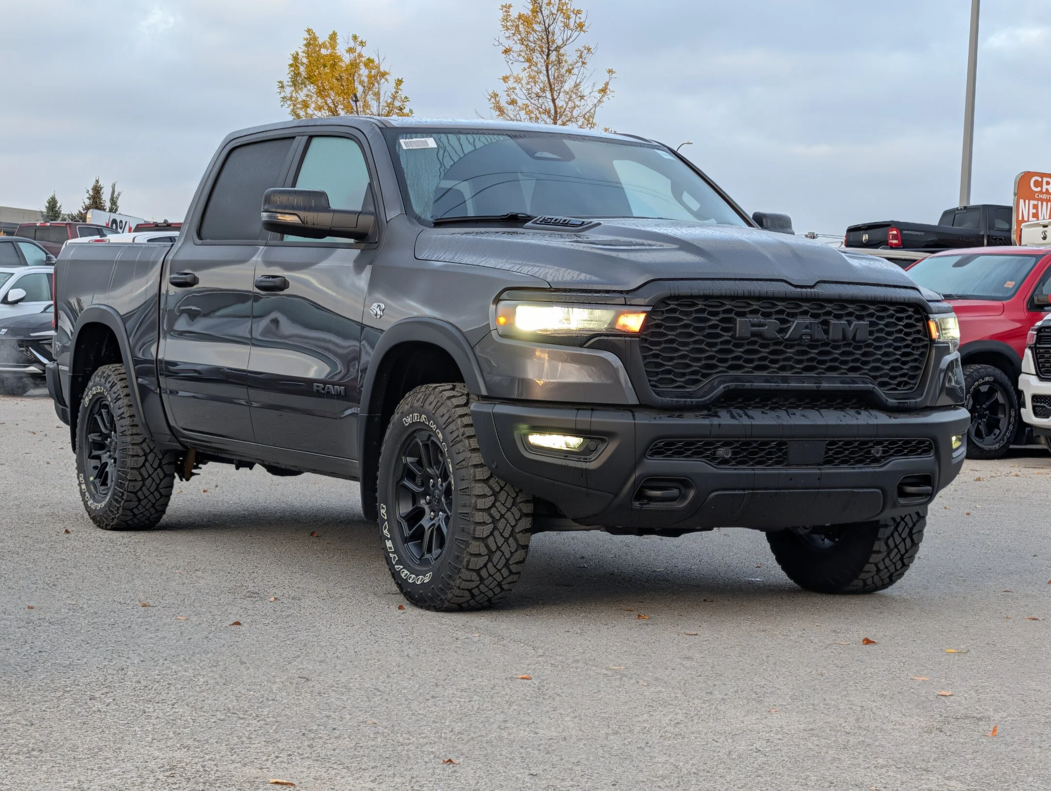 New 2026 Grey RAM Rebel - - Level 1 Grp - Steel Sport Hood - Trailer Brake Control - Power Adj Pedals & More! image 2