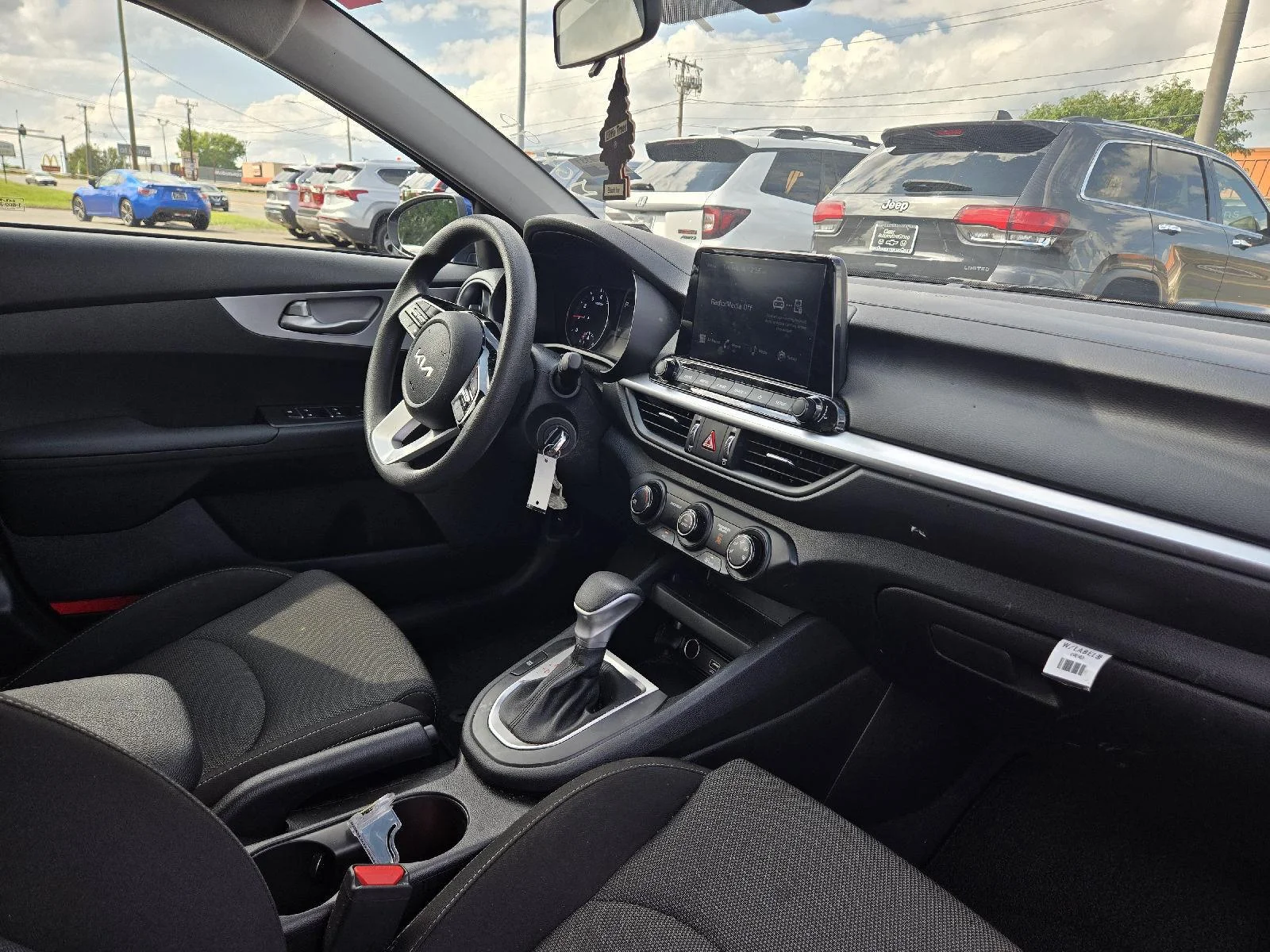 Used 2024 Deep Sea Blue Kia LXS image 6