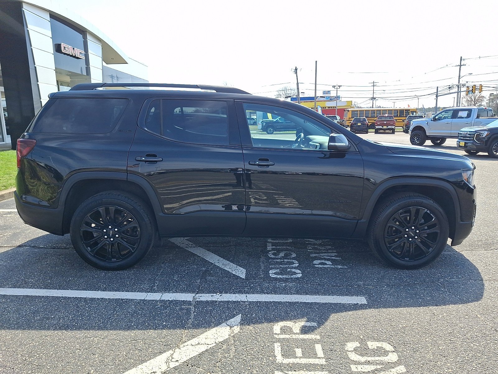 Used 2023 Ebony Twilight Metallic GMC SLE image 12