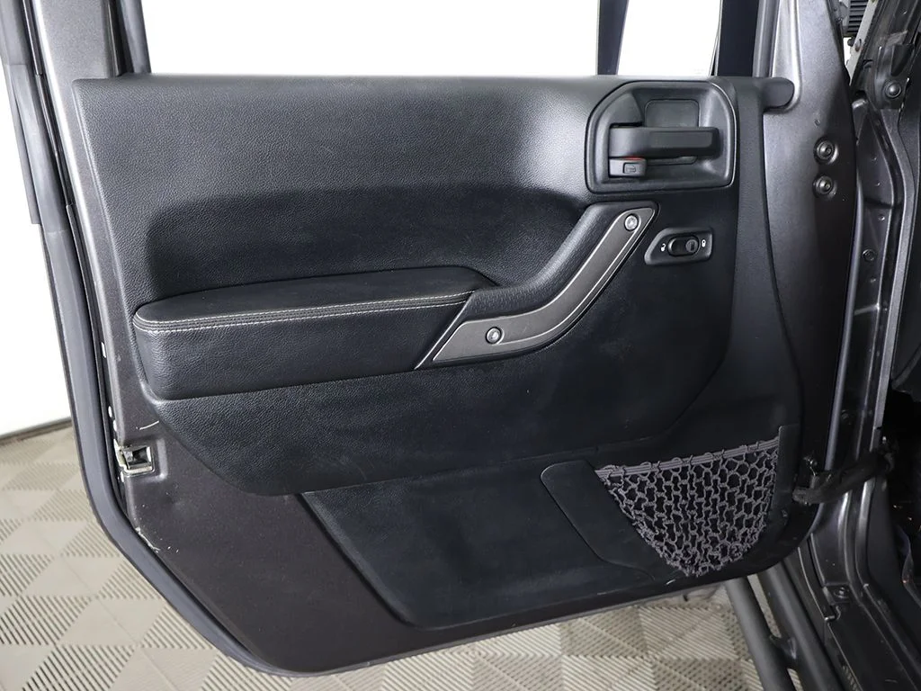 Used 2018 Granite Crystal Metallic Clearcoat Jeep Unlimited Sport image 16