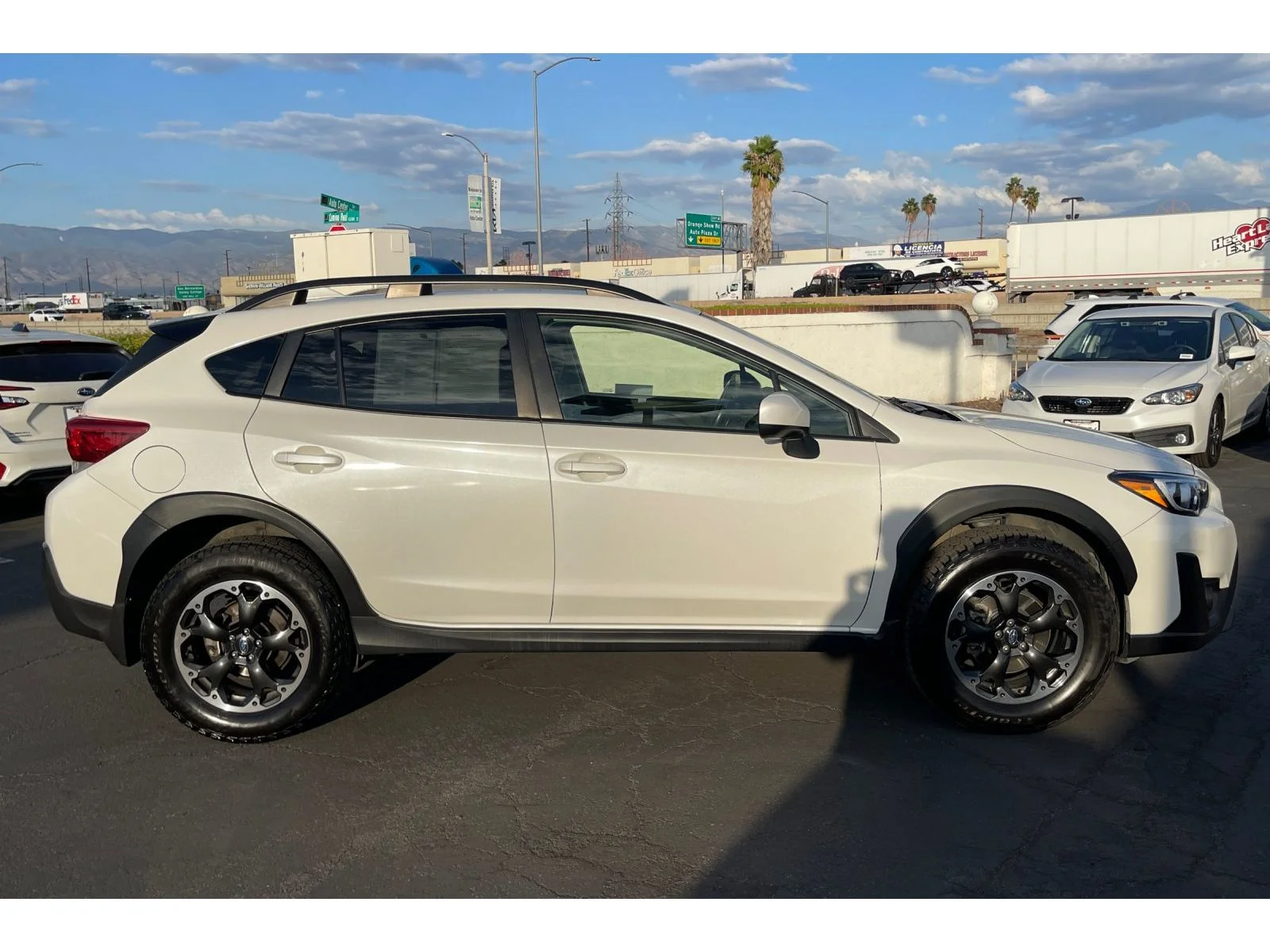 Used 2021 CRYSTAL WHITE PEA Subaru Premium image 7
