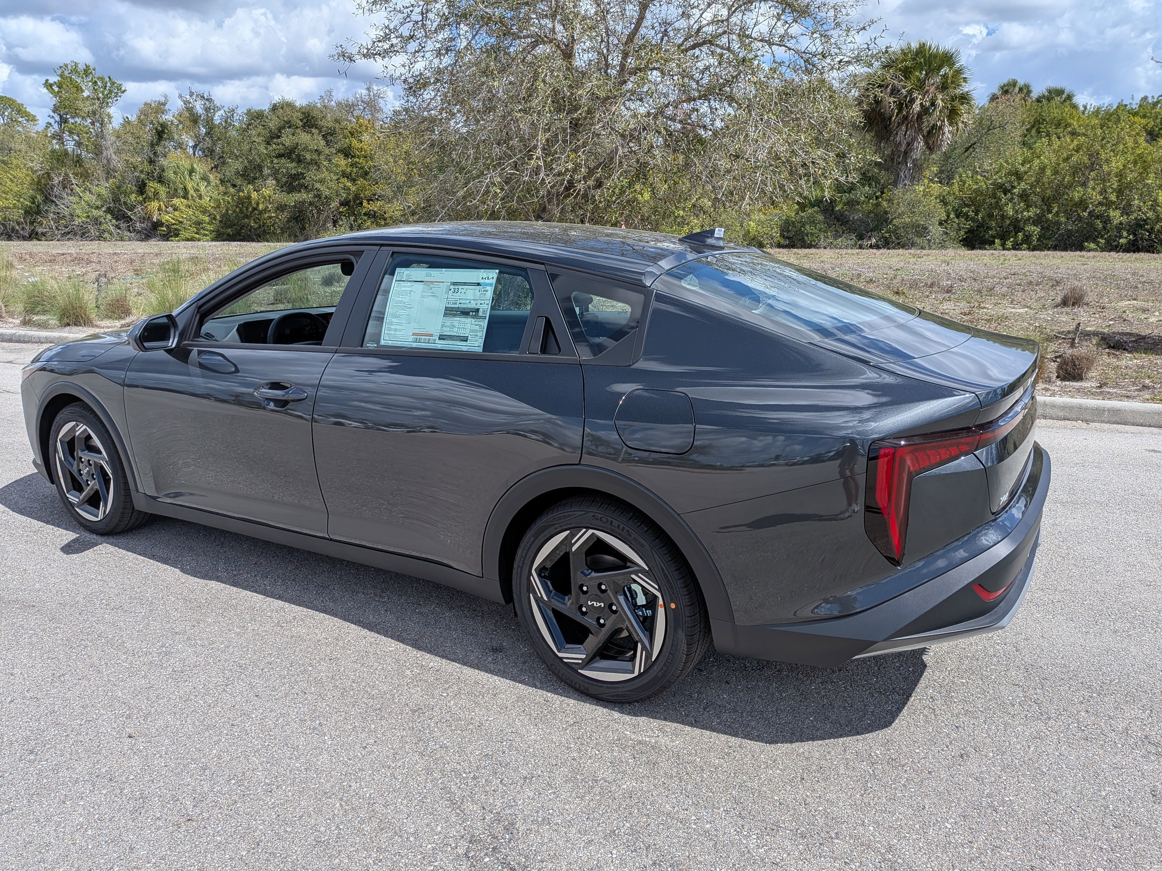 New 2026 Interstellar Gray Kia EX image 7