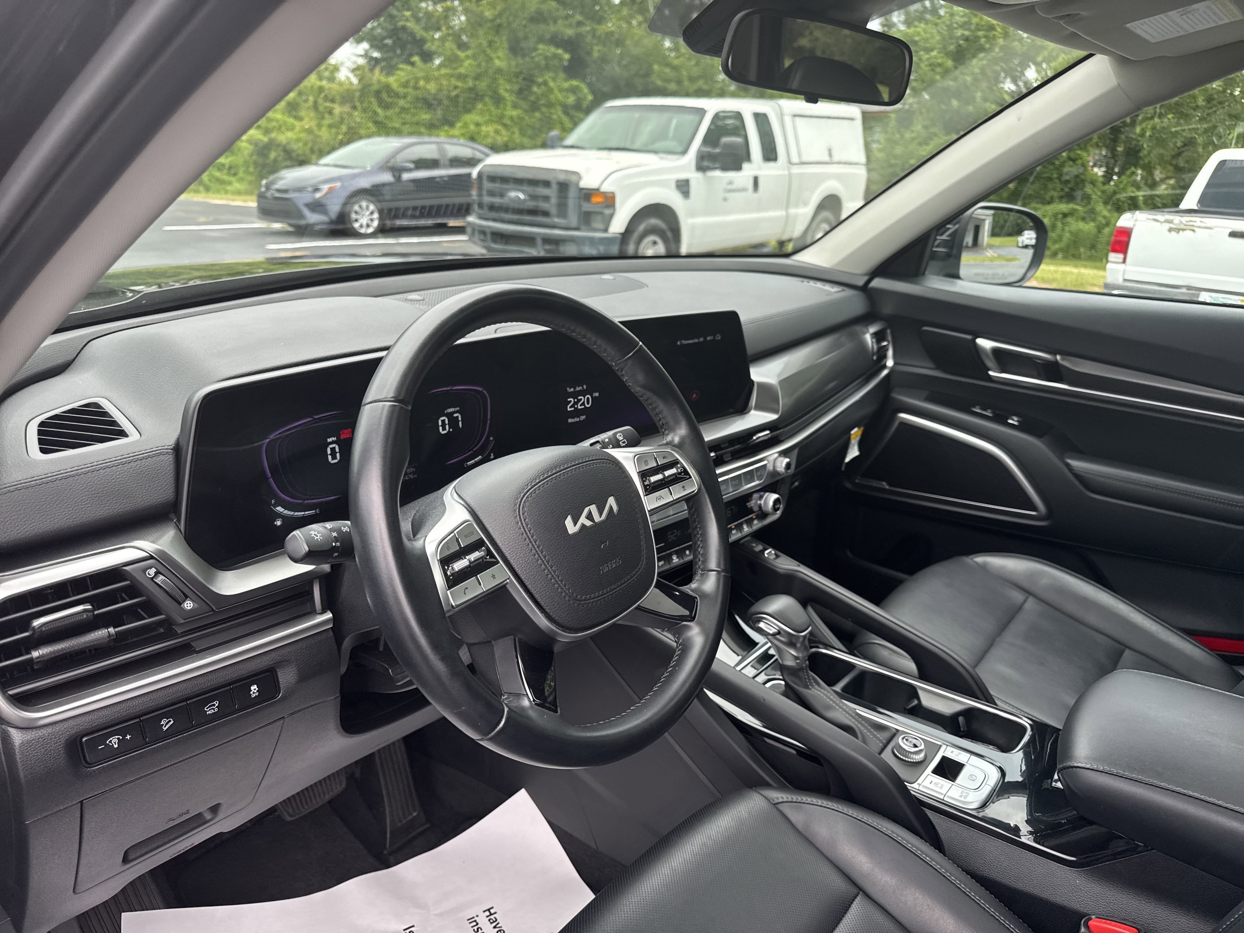 Used 2025 Ebony Black Kia S image 16