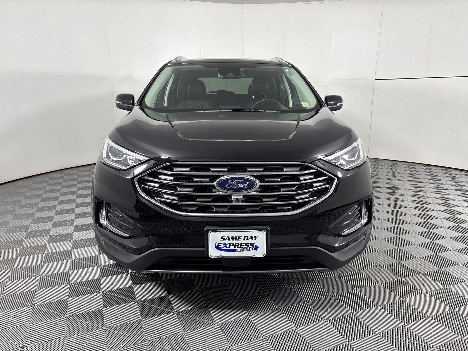 Used 2024 Agate Black Metallic Ford Titanium image 2