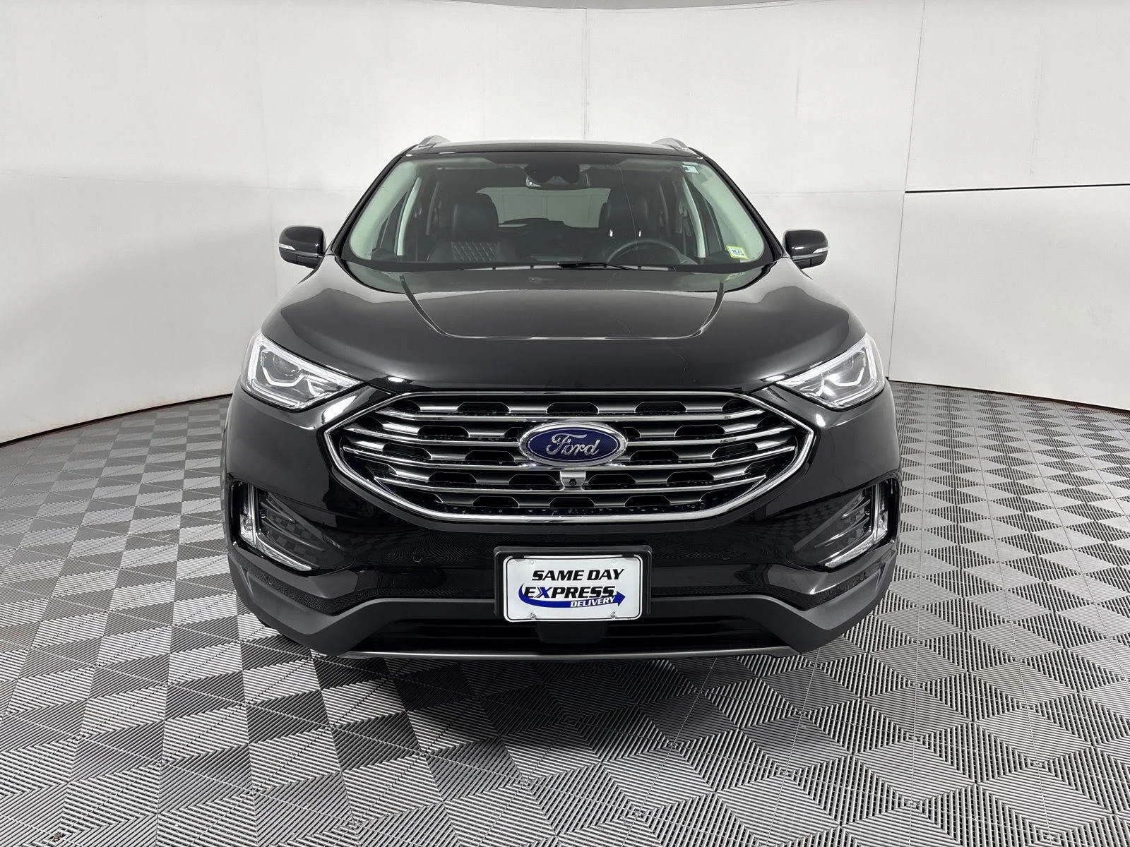 Used 2024 Agate Black Metallic Ford Titanium image 2