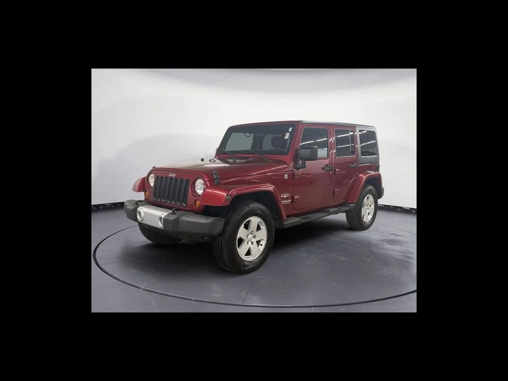 Used 2012 Jeep Wrangler Unlimited Sahara with VIN 1C4BJWEG2CL142321 for sale in Terre Haute, IN