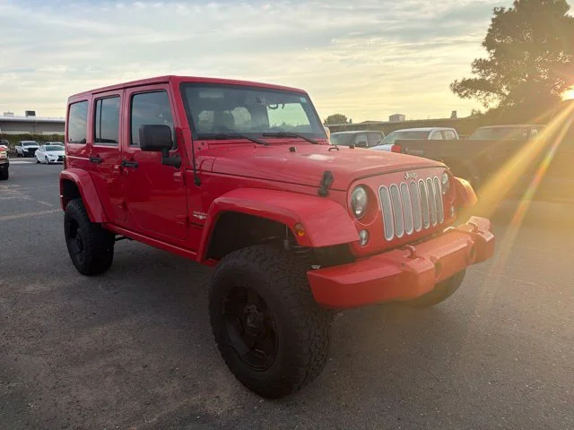 Used 2015 Red Jeep Unlimited Sahara image 5
