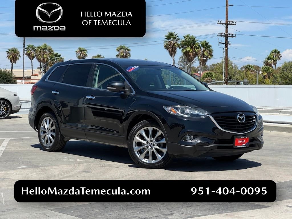 Used 2014 Jet Black Mazda Grand Touring image 1