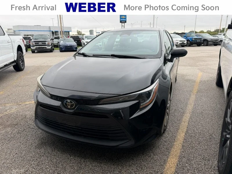 Certified Used 2024 Midnight Black Metallic Toyota LE CVT (Natl) image 1